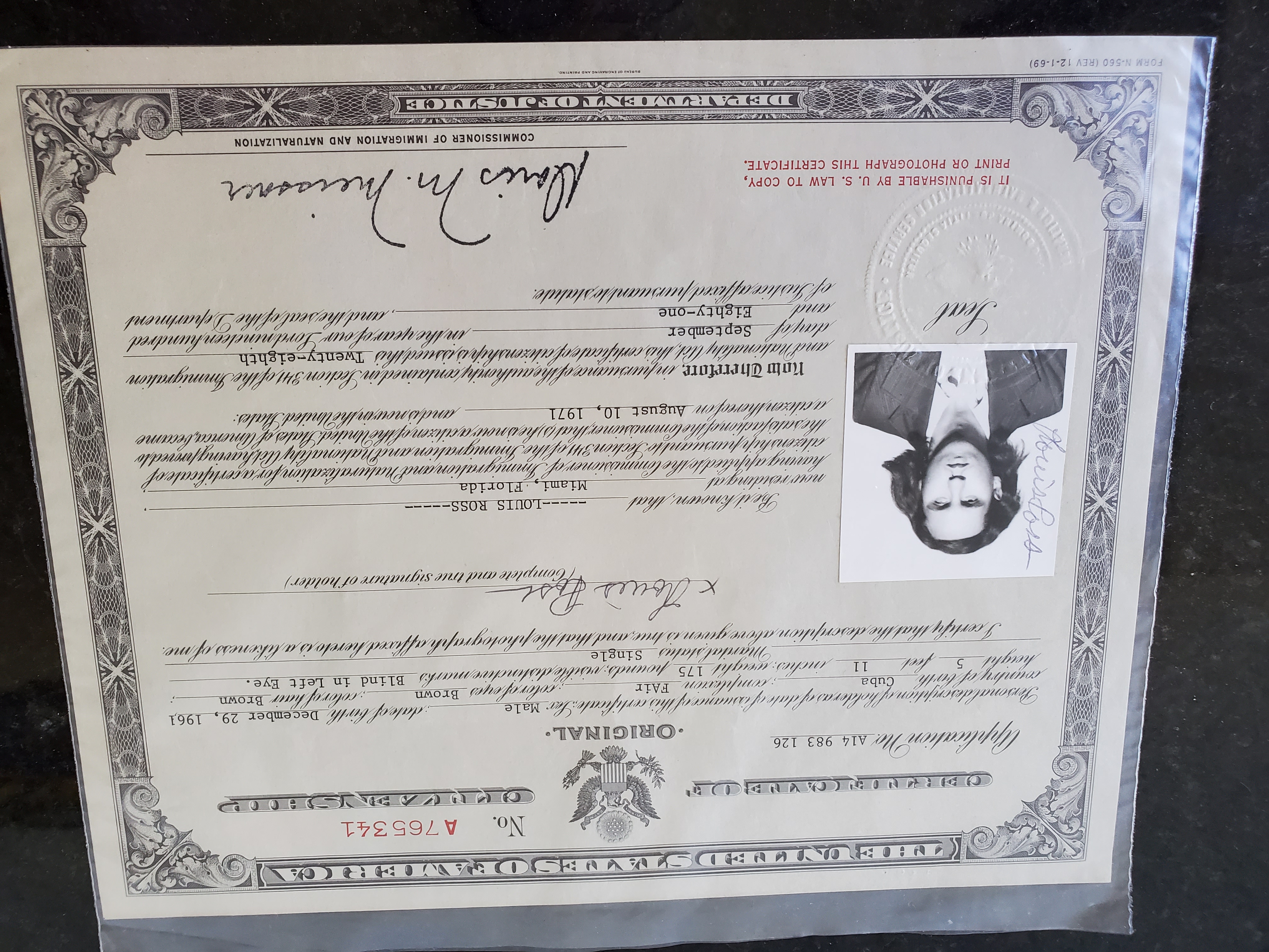 Lou citizenship certificate.